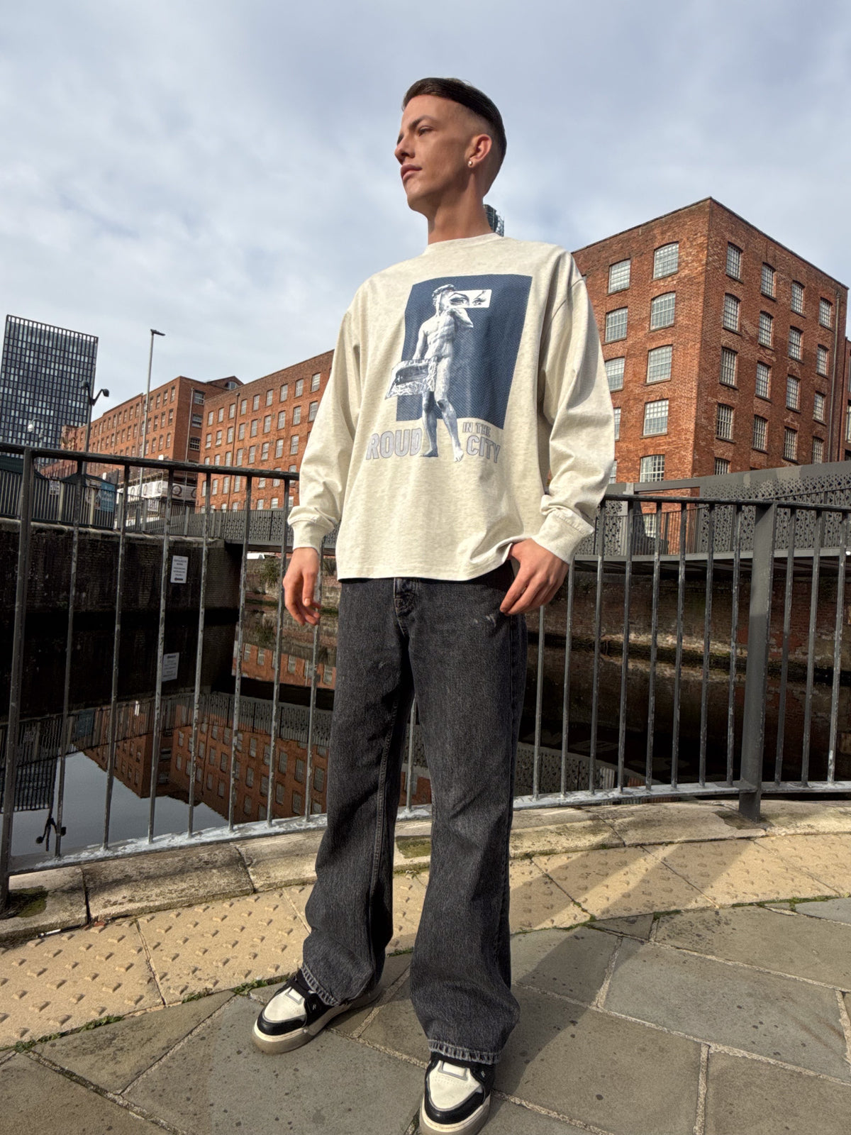 Model wearing the Proud in the City oversized long sleeve tee, front view